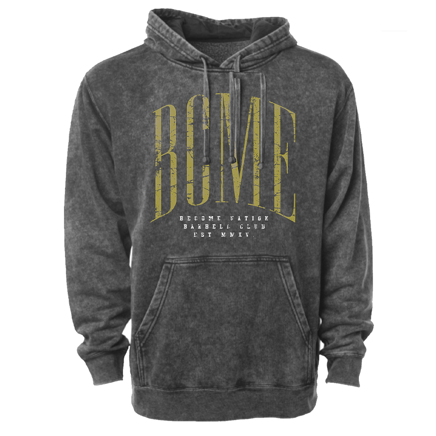 Photo of a stone washed gray hoodie. There is a large yellow screen print reading "BCME" across the chest. There is white screen printing below reading Become Nation barbell club EST MMXV
