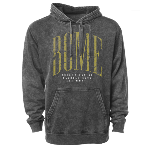 Photo of a stone washed gray hoodie. There is a large yellow screen print reading "BCME" across the chest. There is white screen printing below reading Become Nation barbell club EST MMXV